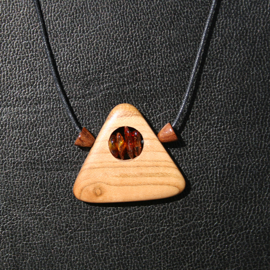 Einzigartiger Ring aus Bernstein und Holz von Rügen