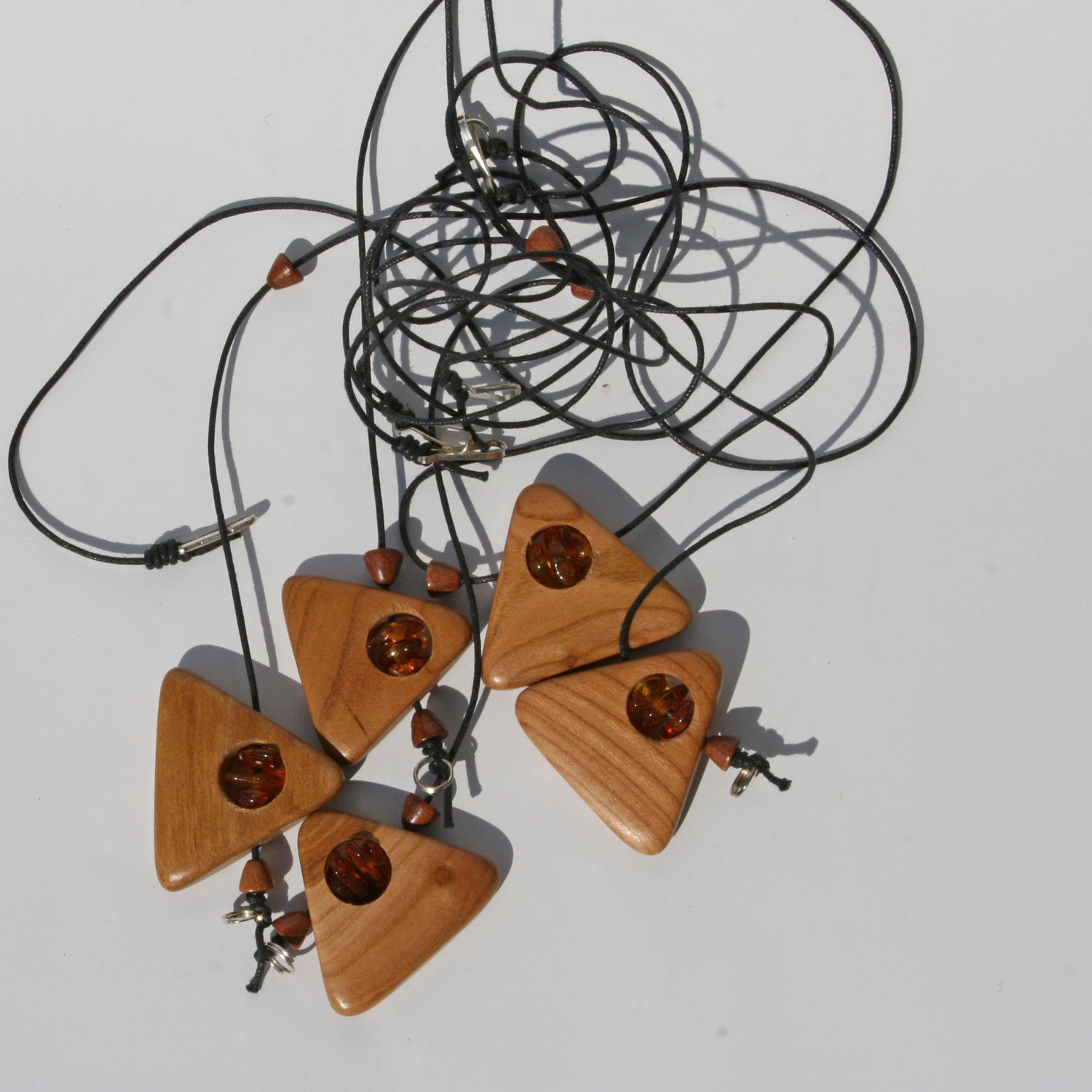 Einzigartiger Ring aus Bernstein und Holz von Rügen