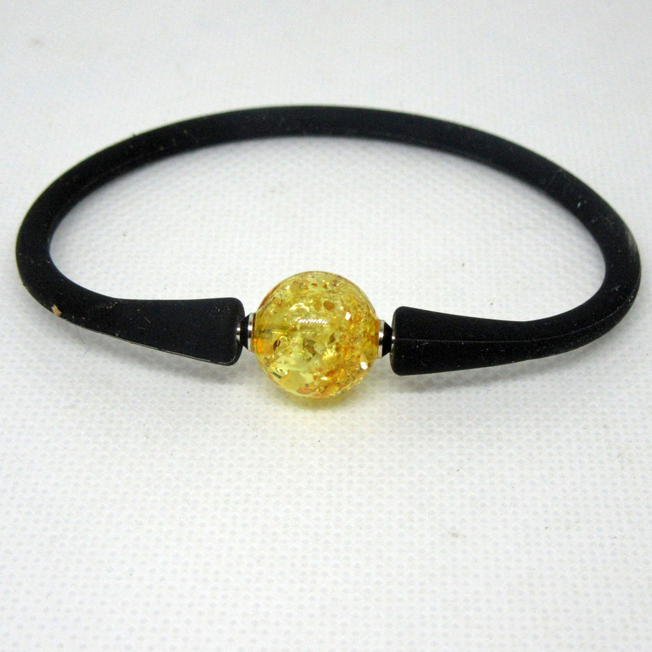 Einzigartiges Silikonarmband mit goldgelber Bernsteinperle