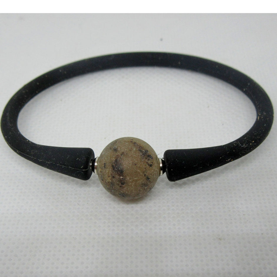 Silikonarmband mit unpolierter Bernsteinperle, Unikat