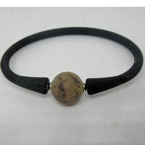 Silikonarmband mit unpolierter Bernsteinperle, Unikat