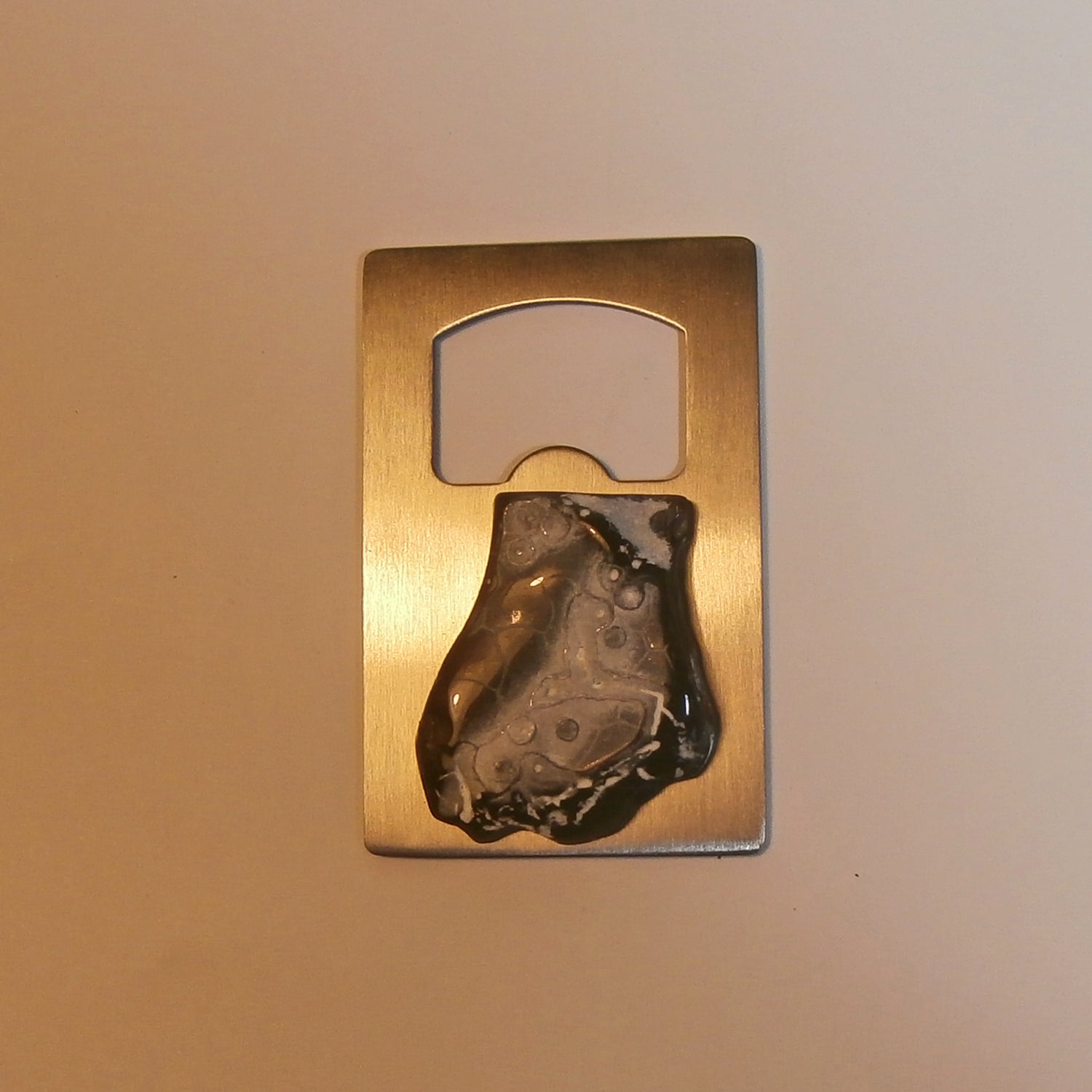 Kapselheber aus Edelstahl mit Seeigel-Unikat