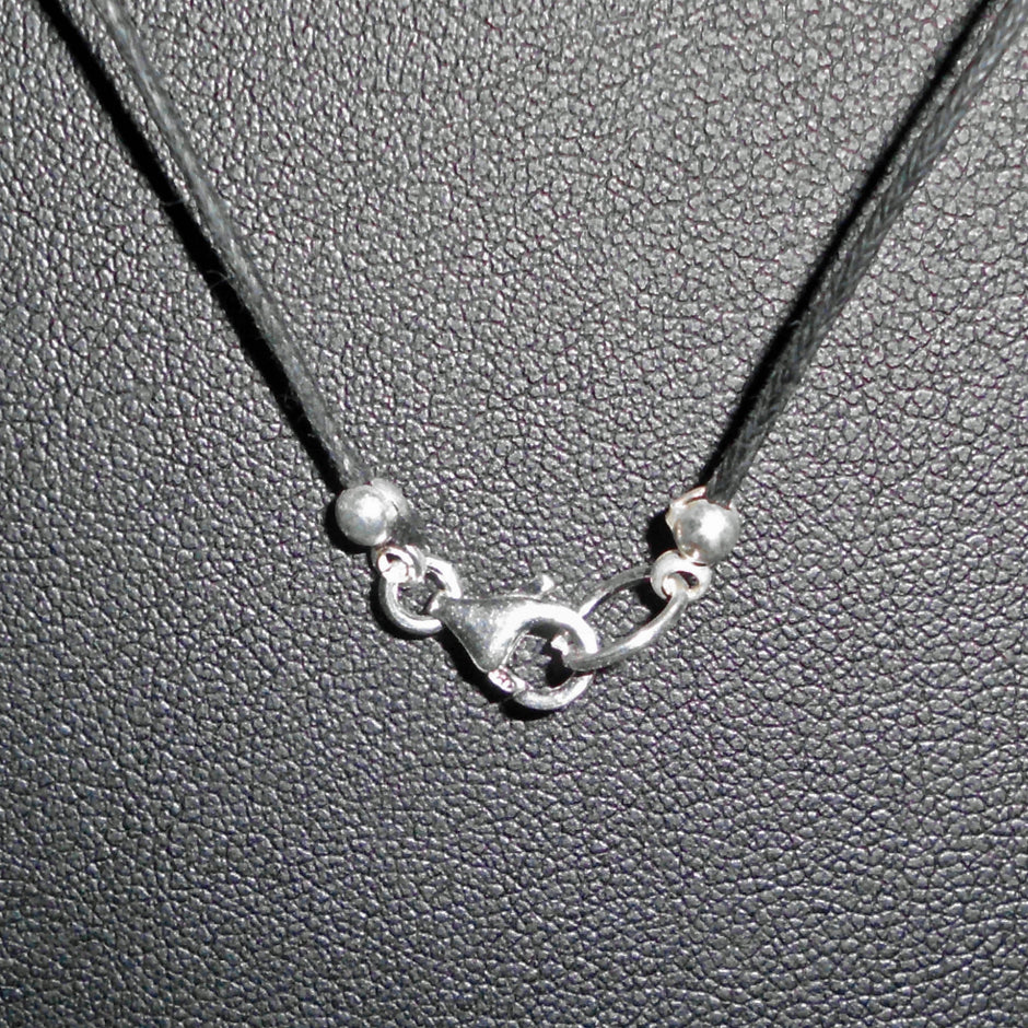 Collier mit Bernsteinwalze und Silberscheiben, Unikat