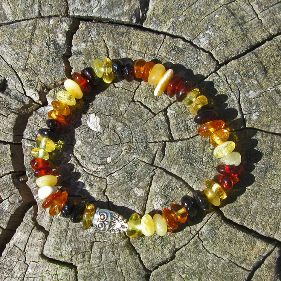 Hochwertiges Kinderarmband aus poliertem Bernstein und Eule oder Elefant