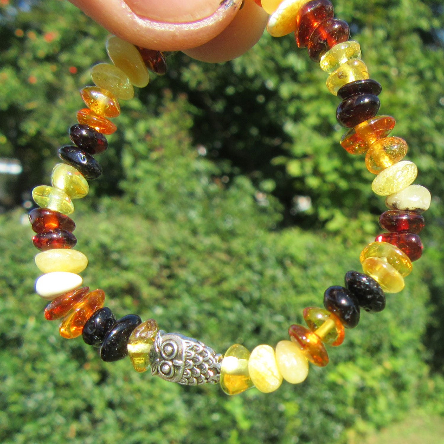 Hochwertiges Kinderarmband aus poliertem Bernstein und Eule oder Elefant