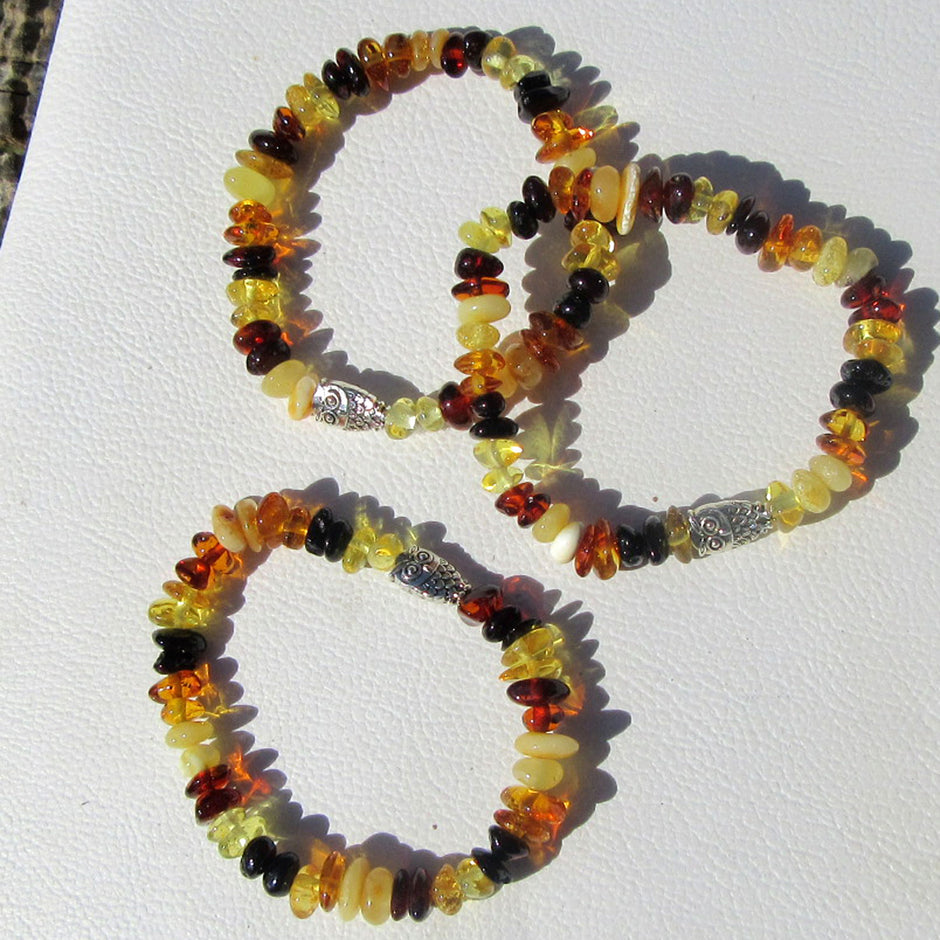 Hochwertiges Kinderarmband aus poliertem Bernstein und Eule oder Elefant