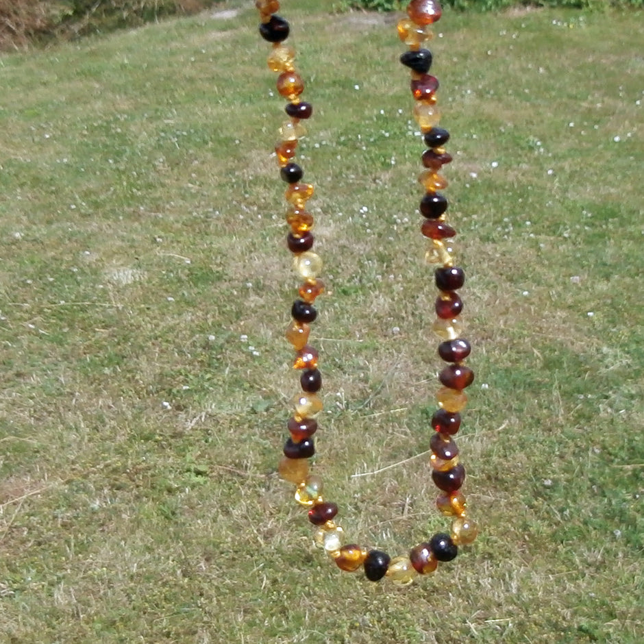 Kinderkette aus polierten Bernsteinnuggets, 32 cm