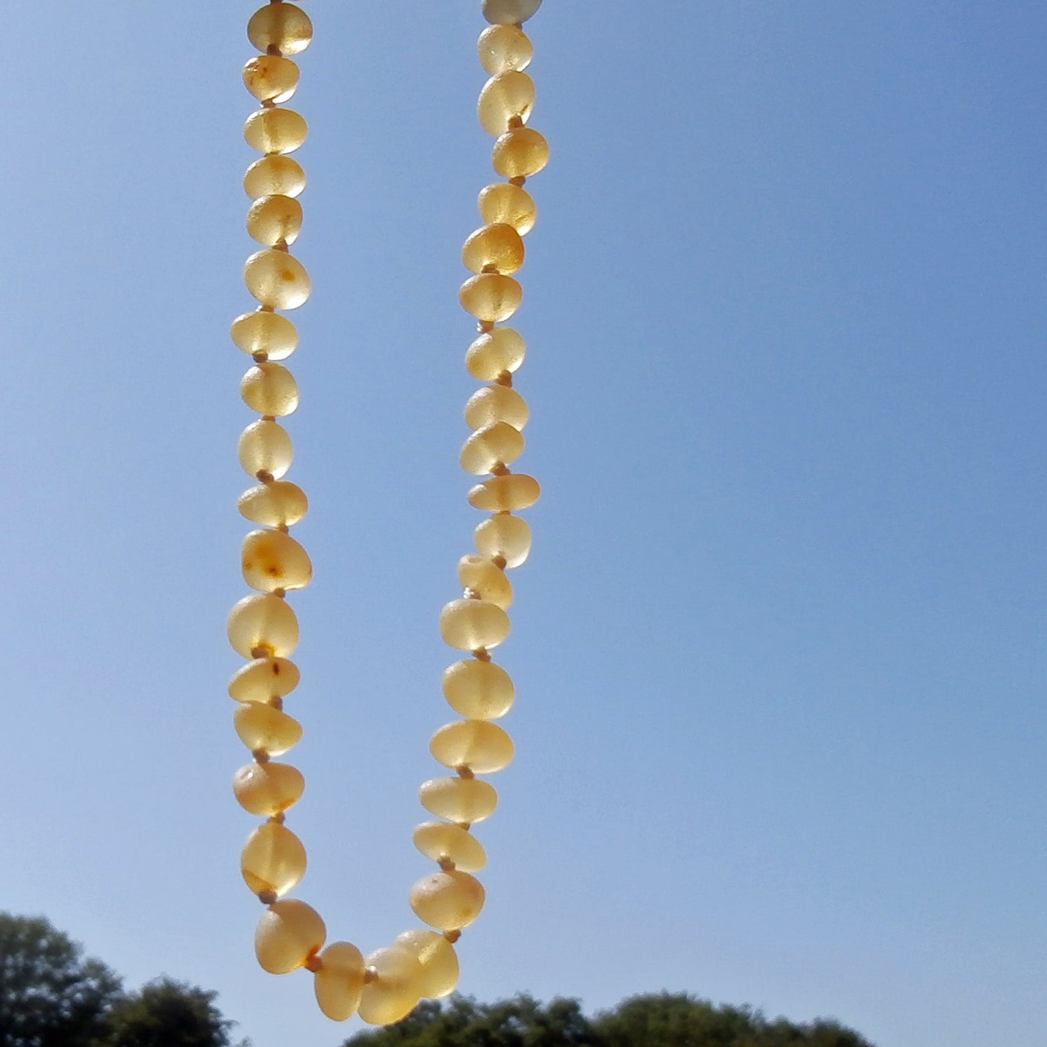 Bernstein Zahnungskette mit unpolierten Perlen – Unikat