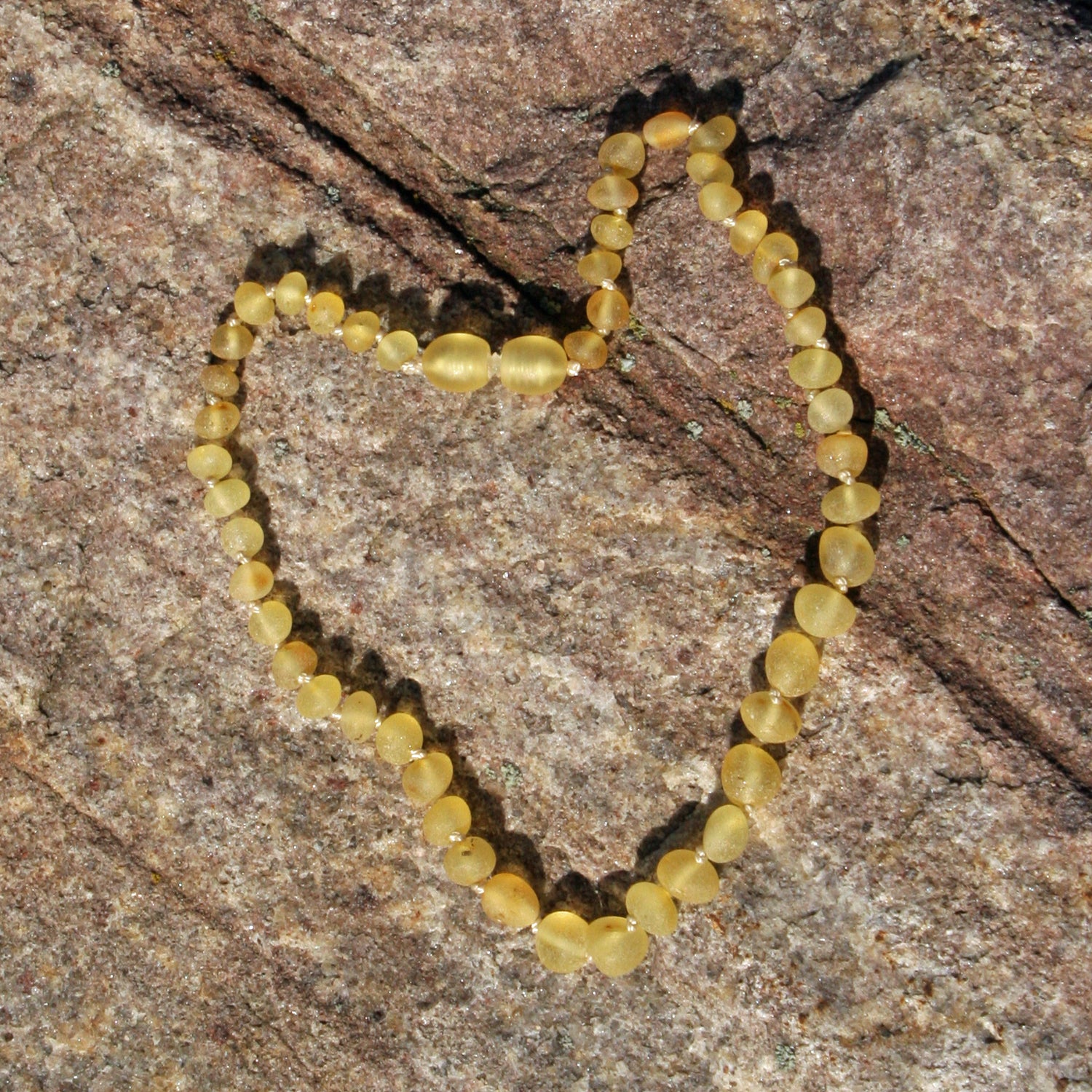 Bernstein Zahnungskette mit unpolierten Perlen – Unikat