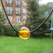 Ledercollier mit kognacfarbener Bernsteinperle, Unikat