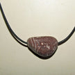 Ledercollier mit rötlichem Orthoceras von Rügen