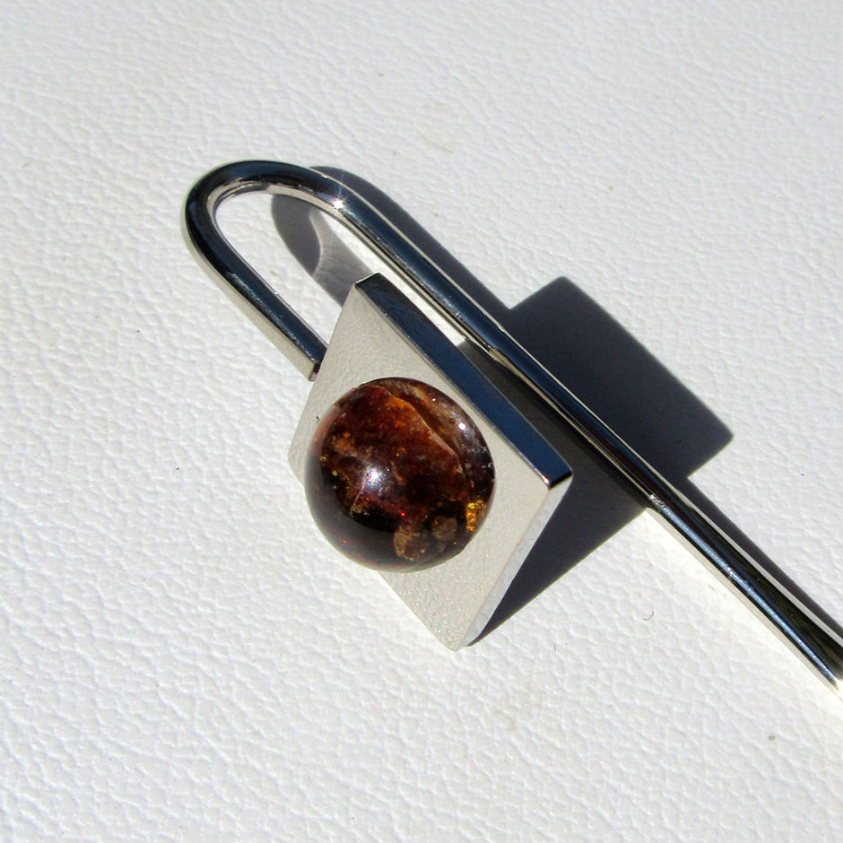 Einzigartiges Lesezeichen aus Bernstein und Metall