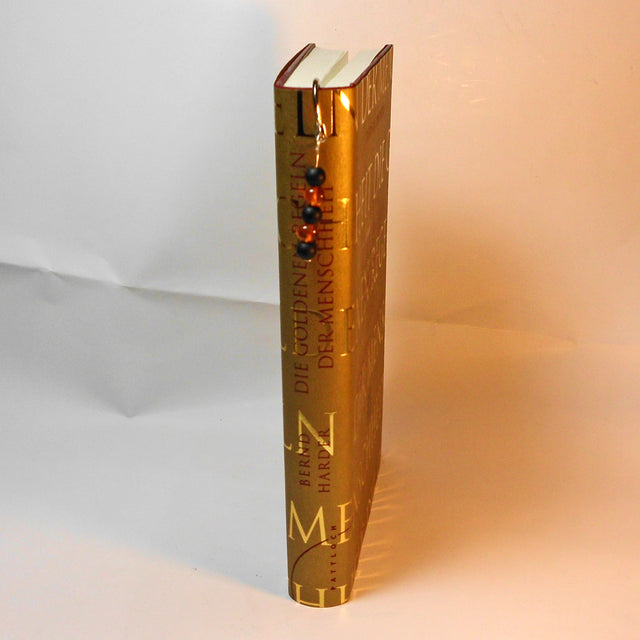 Lesezeichen aus Bernstein und schwarzen Glasperlen