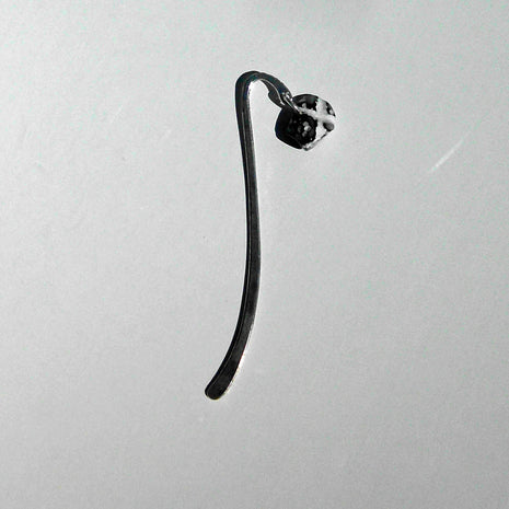 Lesezeichen aus Feuerstein mit Hühnergott-Motiv