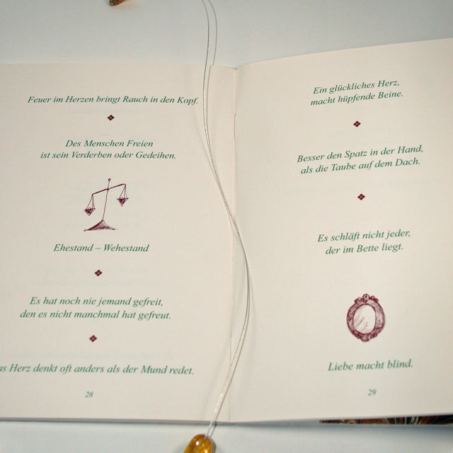 Lesezeichen aus flexiblem Draht mit 3 Bernsteinen