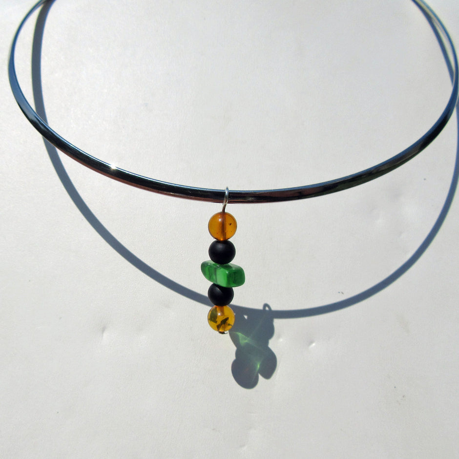 Einzelstück: Anhänger aus Seeglas und Bernstein von Rügen