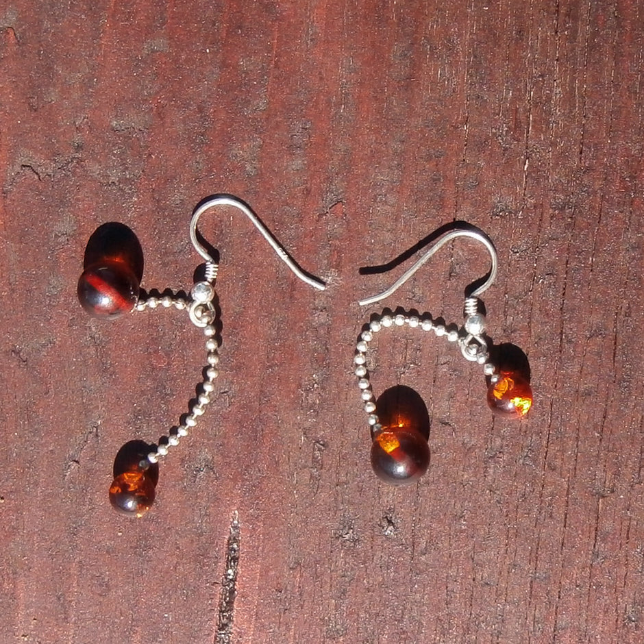 Einzigartige Ohrhänger aus Bernstein und Silber