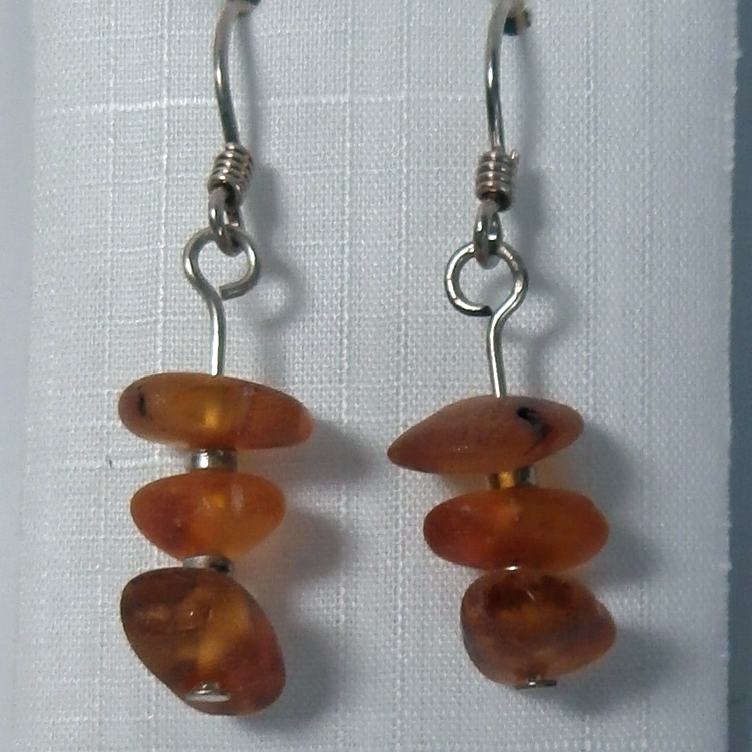 Ohrhänger aus Bernstein und silbernen Glasperlen – Unikat