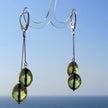Lange Ohrhänger aus facettierten Bernsteinoliven und Silber