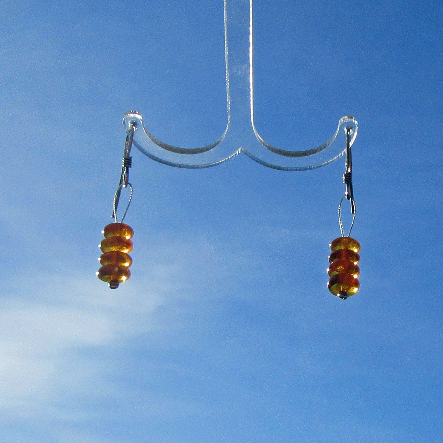 Ohrhänger aus Silber mit 4 polierten Bernsteinscheibchen