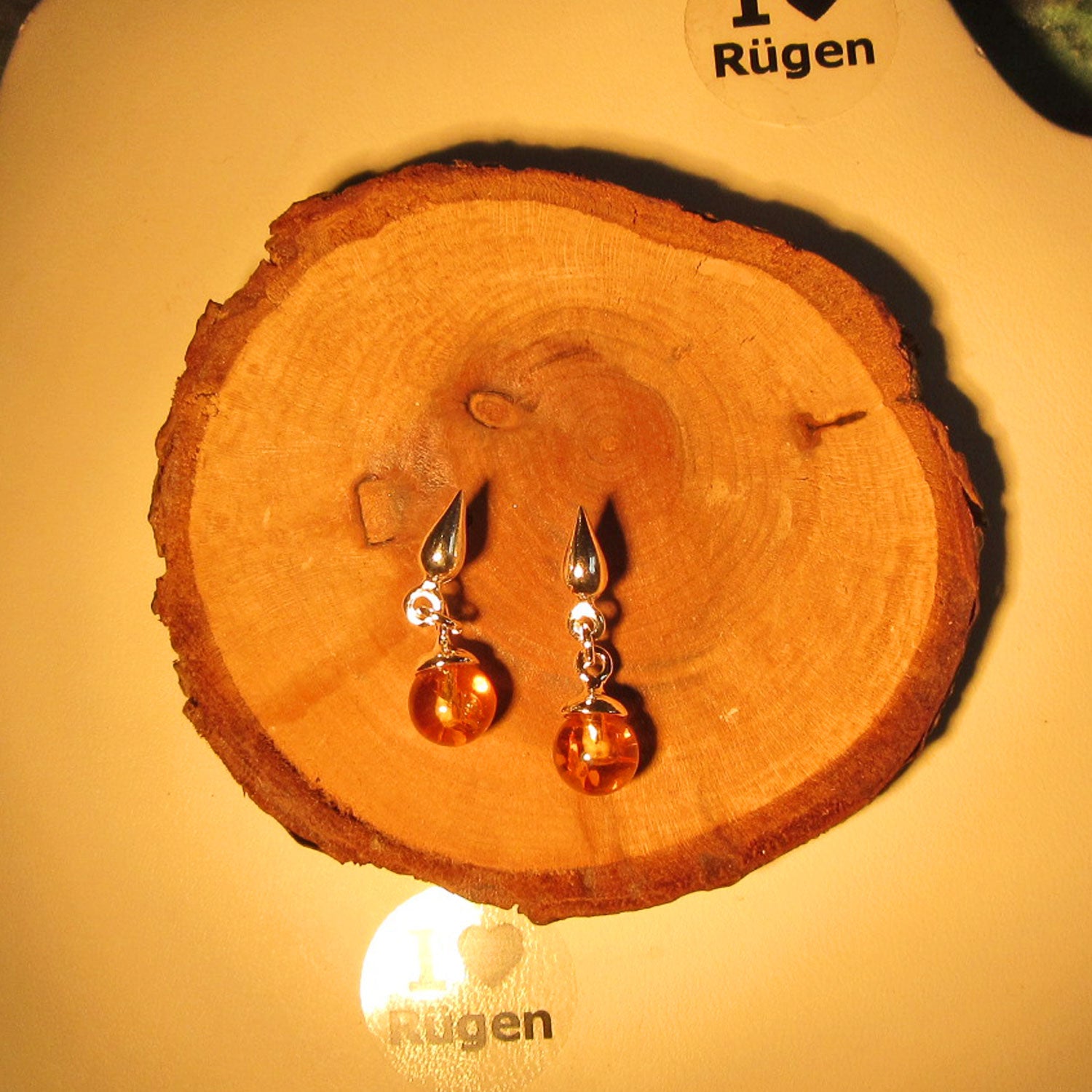 Ohrstecker aus 925er Silber mit kognacfarbenen Bernsteinperlen