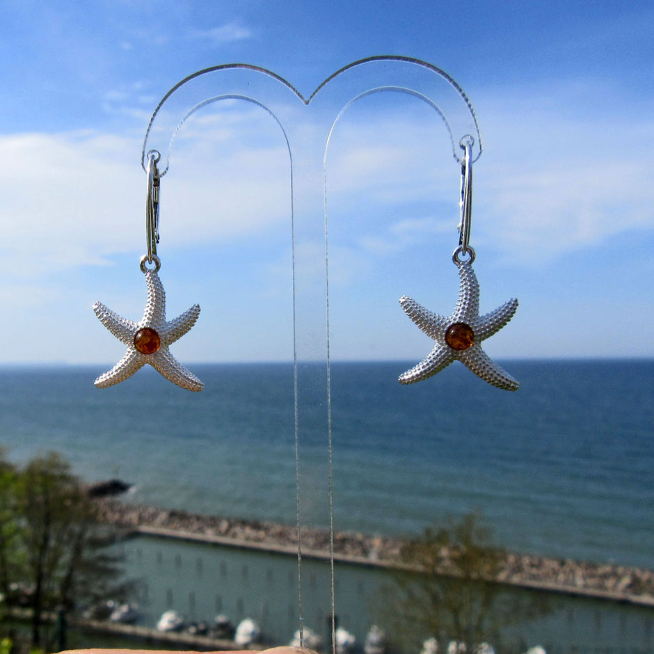 Silberner Ohrhänger Seestern mit Bernsteinperle, Unikat