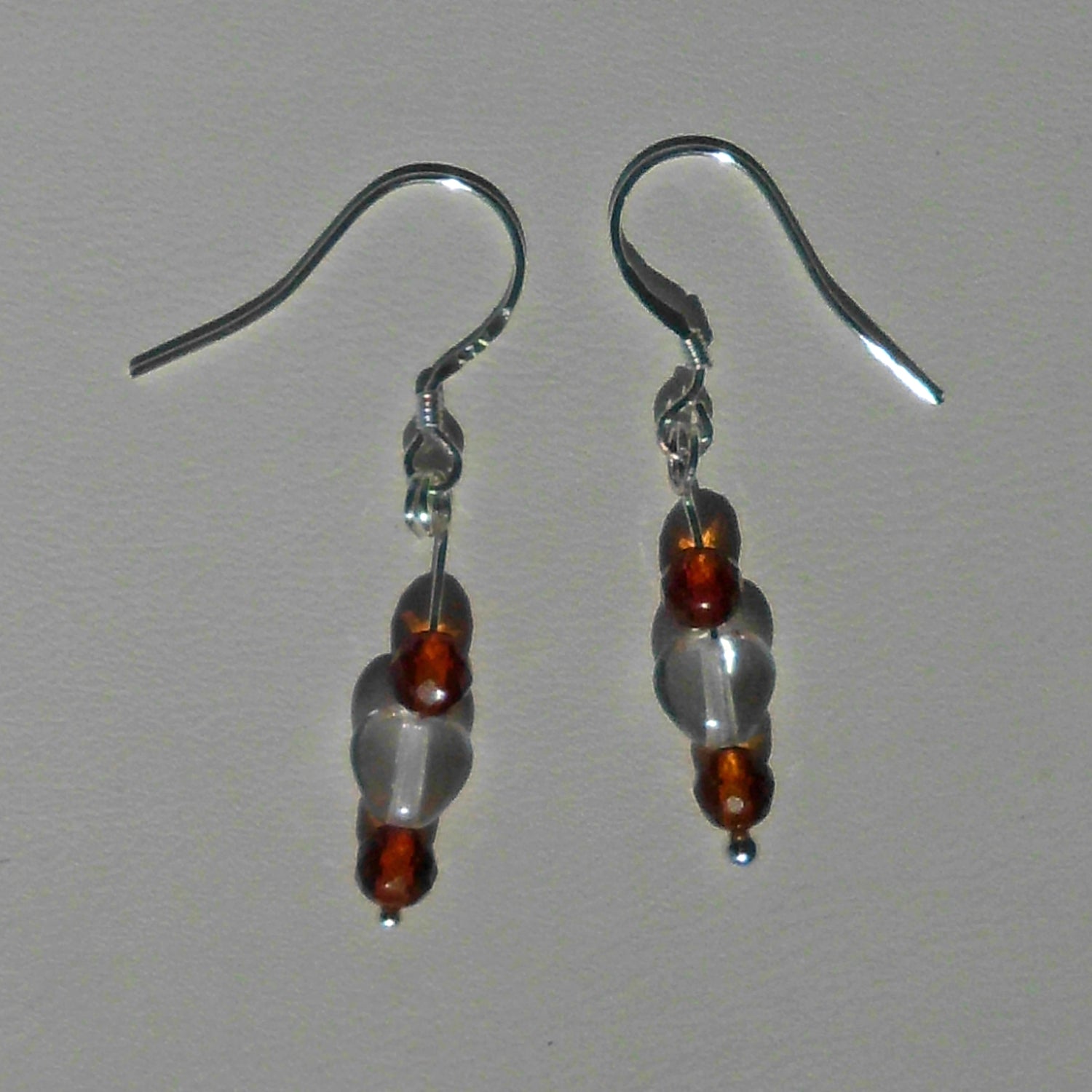 Ohrhänger aus Bernstein und Glasherz, Unikat von Rügen