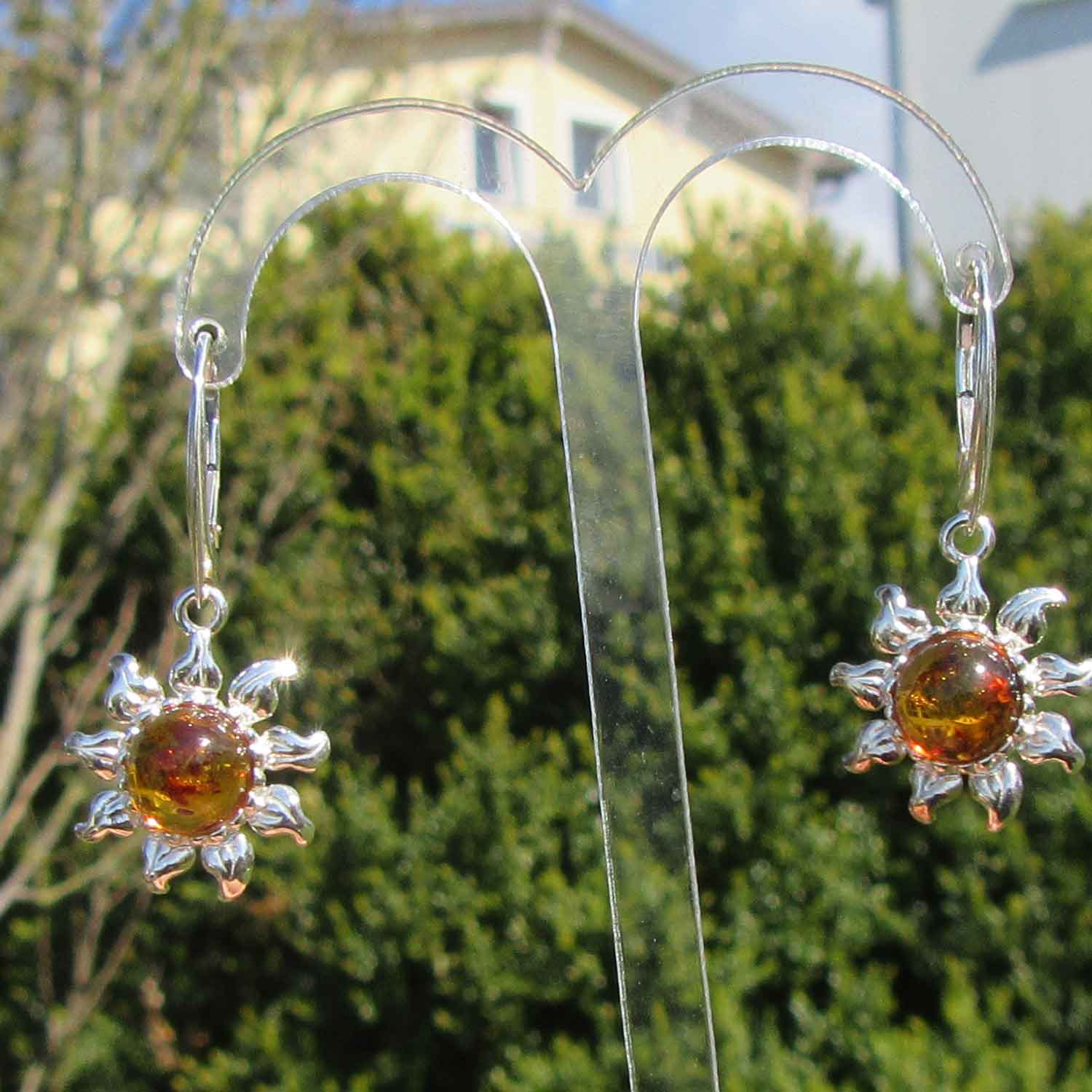 Silberner Ohrhänger Sonne mit goldgelbem Bernstein