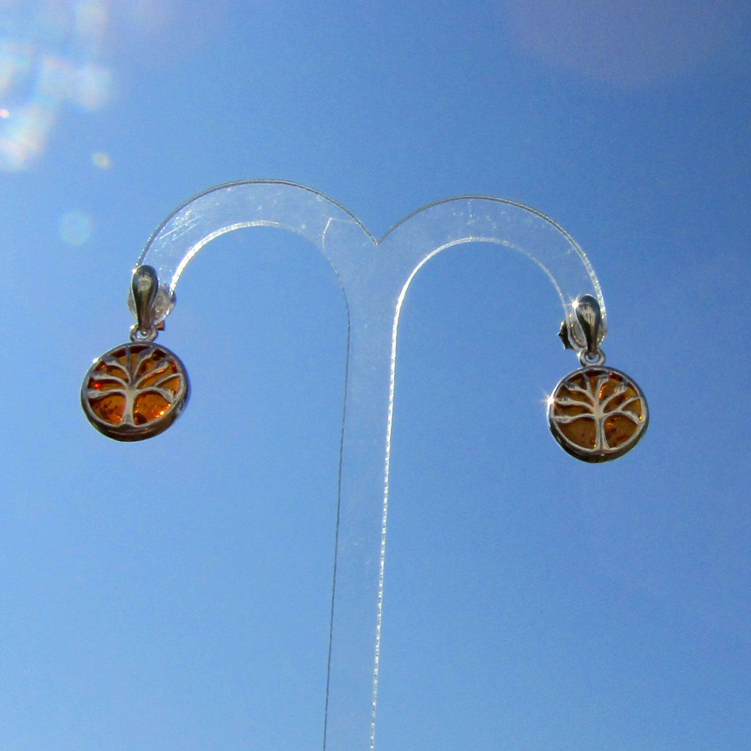 Edle Ohrstecker aus kognacfarbenem Bernstein und Silber