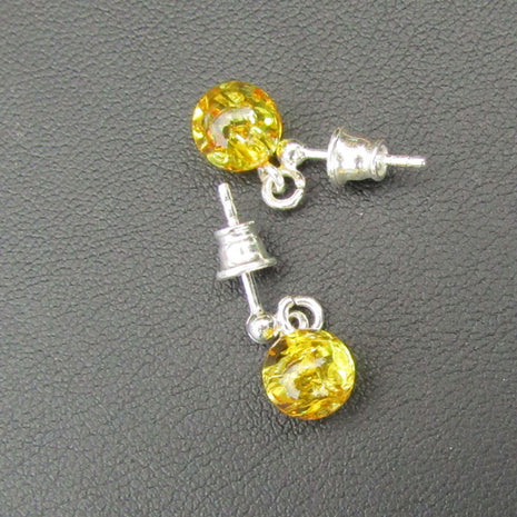 Elegante Ohrstecker aus poliertem Bernstein und Silber