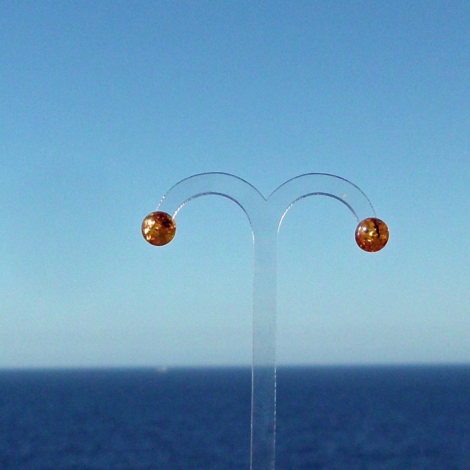 Ohrstecker aus kognacfarbenem Bernstein und Silber 925