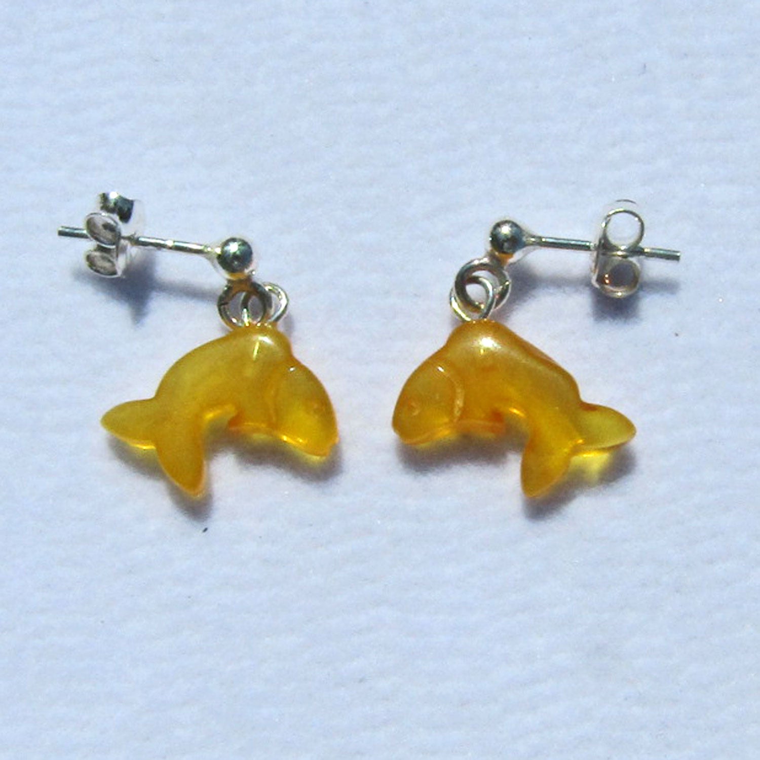 Ohrhänger Delphin aus butterscotch Bernstein, Silber 925