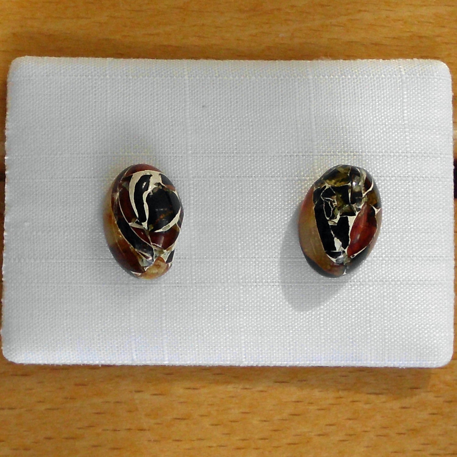 Ohrsteckeraus verbundenem ovalen Bernsteinen / Mosaikbernstein