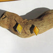 Ohrstecker aus poliertem Bernstein in Rautenform