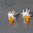 Filigrane Ohrstecker aus Bernstein in Spinnenform
