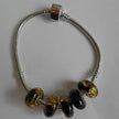 Polierter Moorbernstein-Bead für Pandora