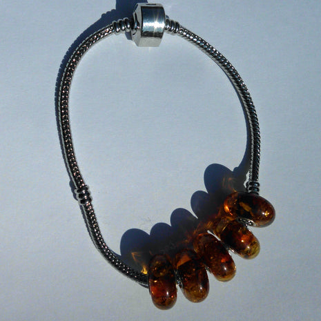 Kognacfarbener Bernstein-Bead mit Silberkern für Pandora