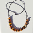 Collier aus unpoliertem Bernstein und Holzperlen
