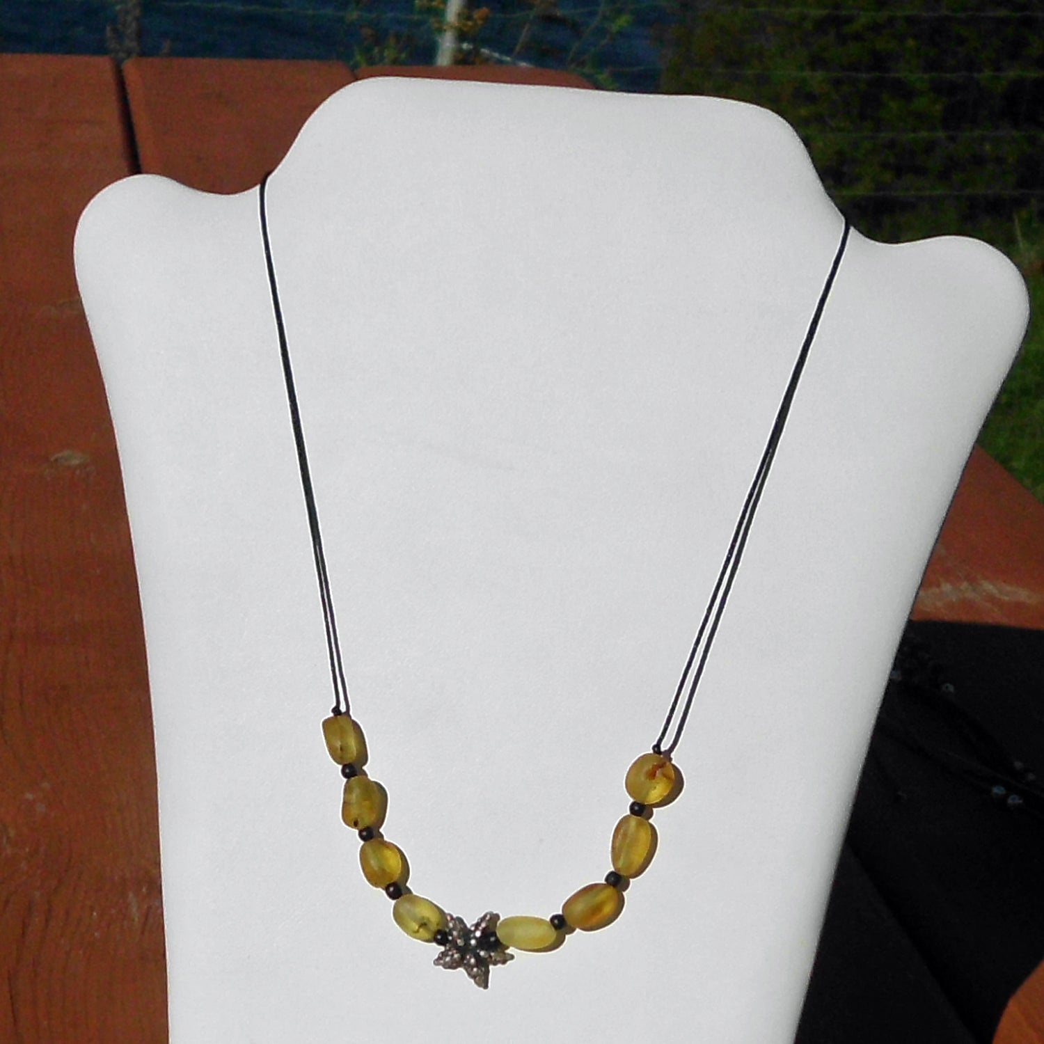 Collier mit Seestern aus Silber 925 und Bernsteinperlen