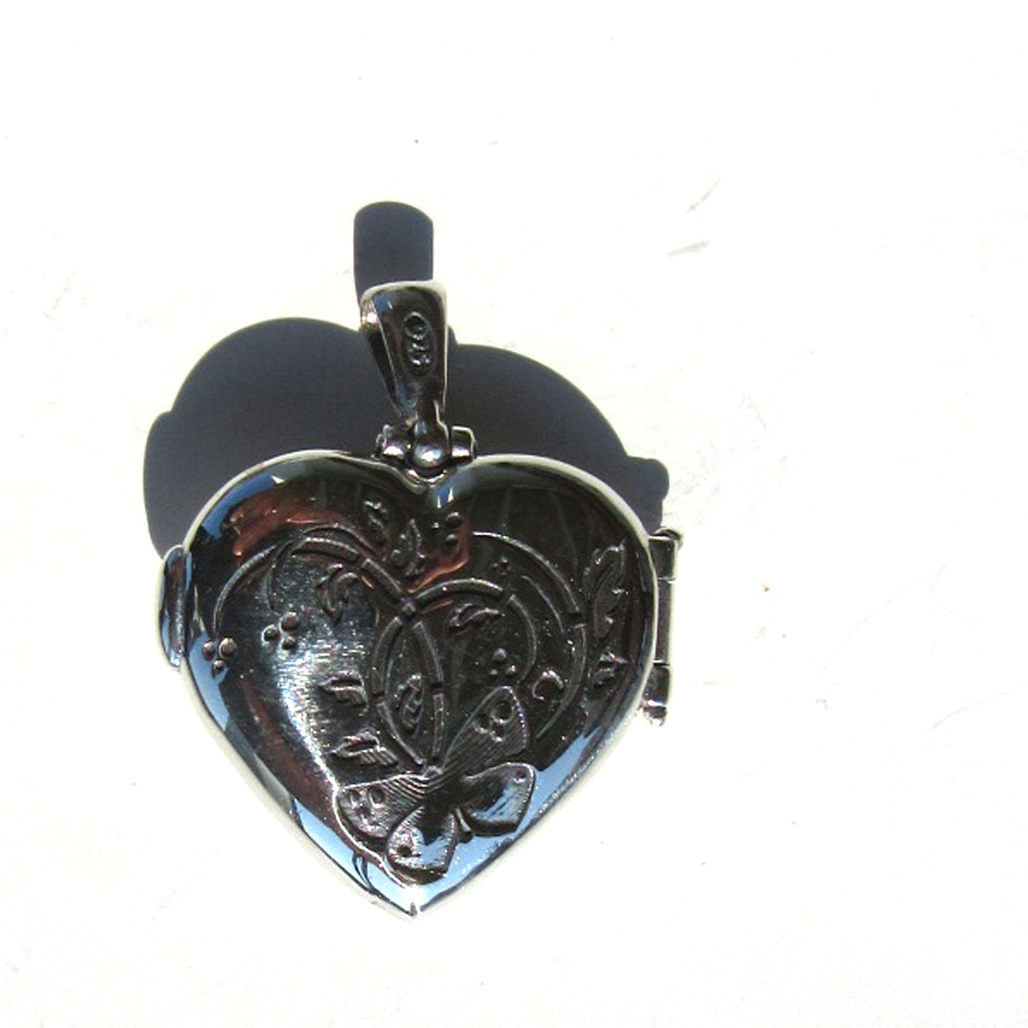 Silbernes Herz-Medaillon mit Bernstein, Aufklappbar