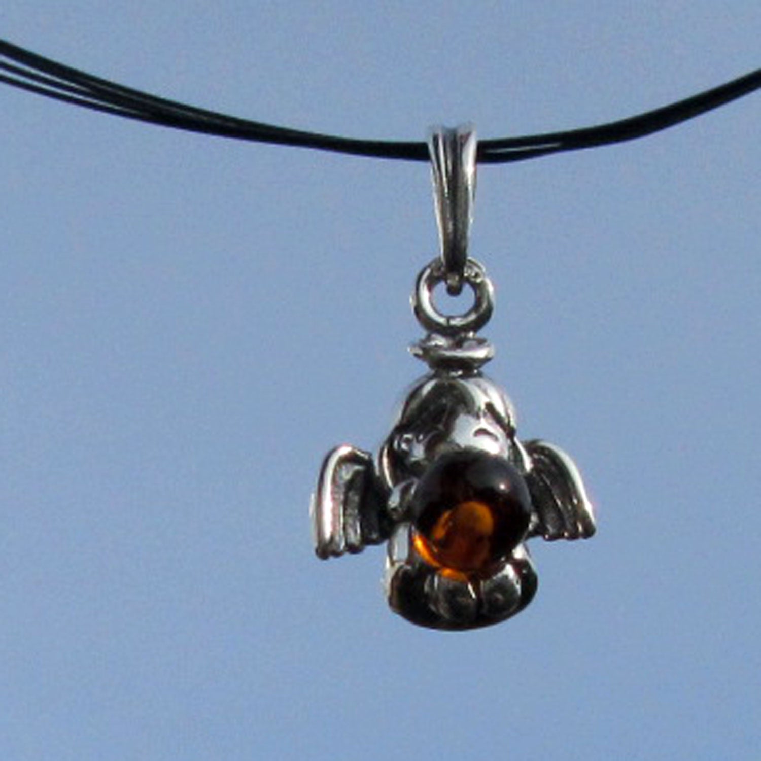 Silberanhänger mit Bernsteinperle, einzigartig und maritim