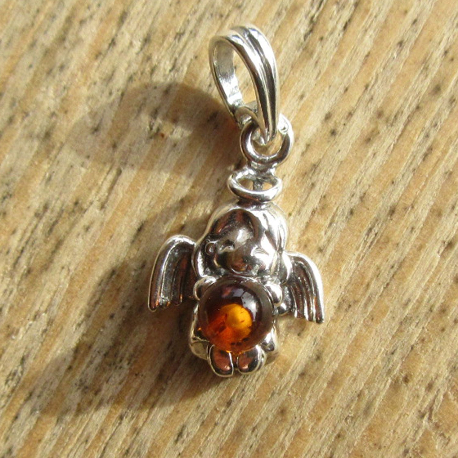 Silberanhänger mit Bernsteinperle, einzigartig und maritim
