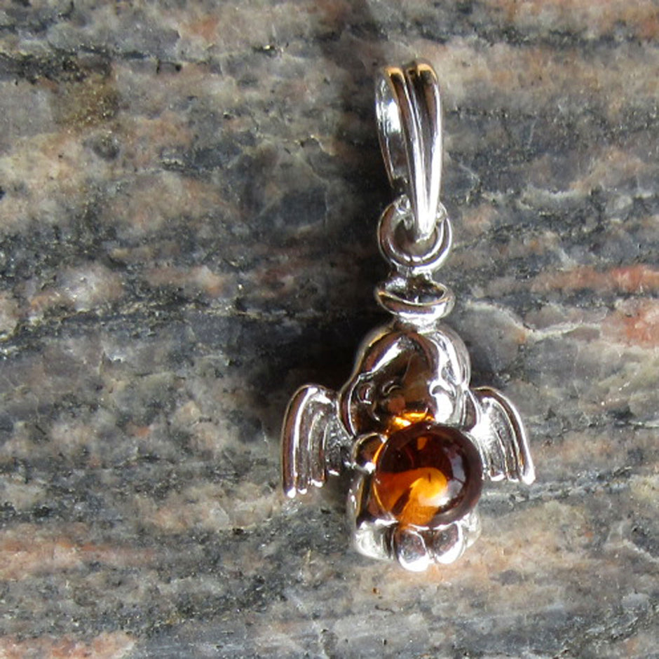 Silberanhänger mit Bernsteinperle, einzigartig und maritim