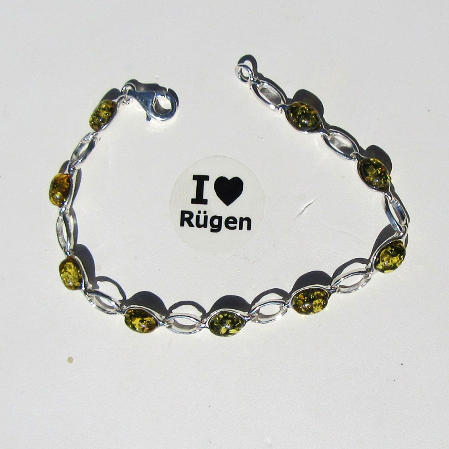 Silberarmband mit grünem und buntem Bernstein, Unikat