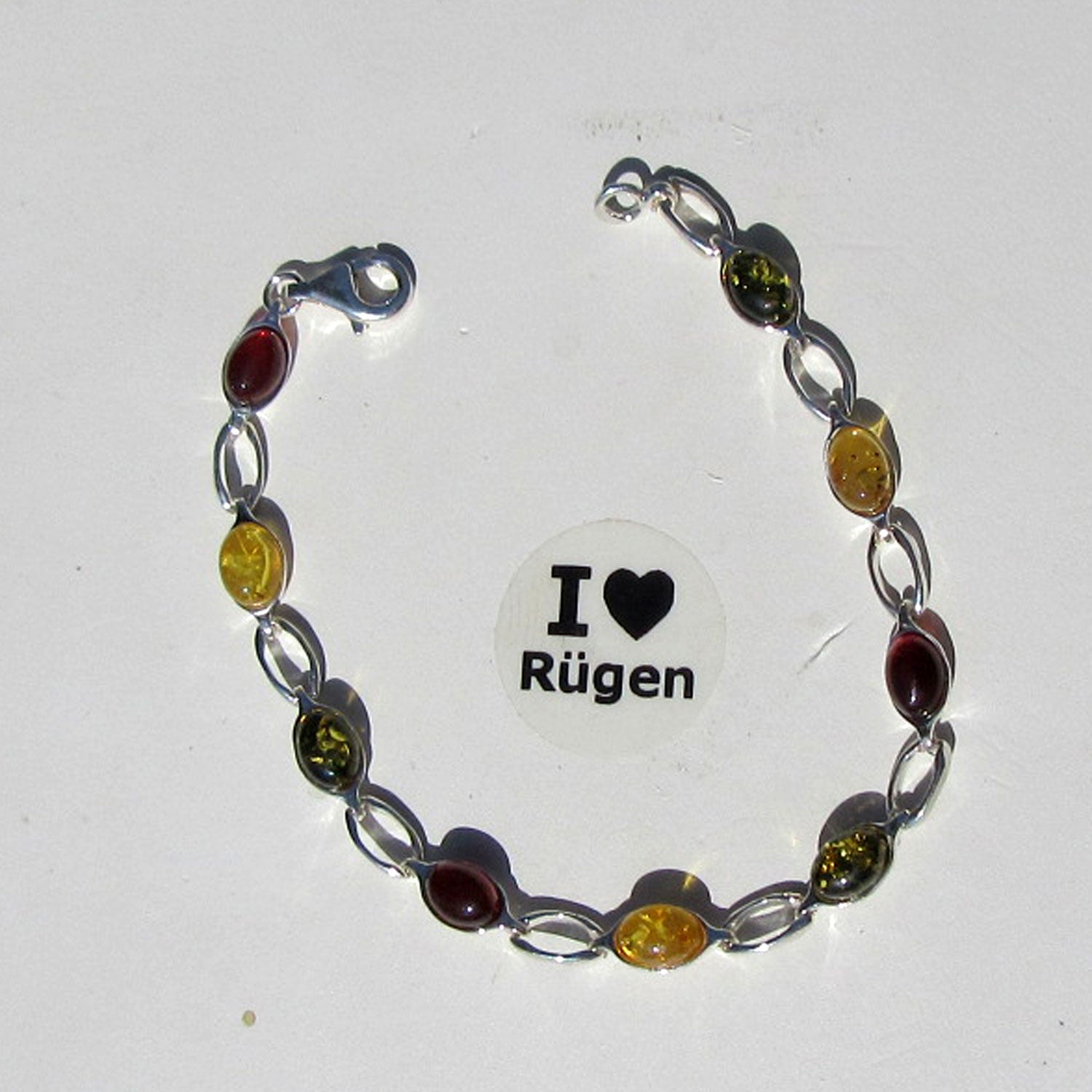 Silberarmband mit grünem und buntem Bernstein, Unikat