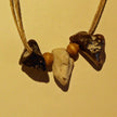 Hühnergötter-Collier aus Feuerstein und Sisal