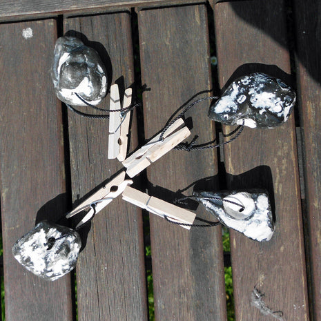 Tischdeckenbeschwerer aus polierten Hühnergöttern